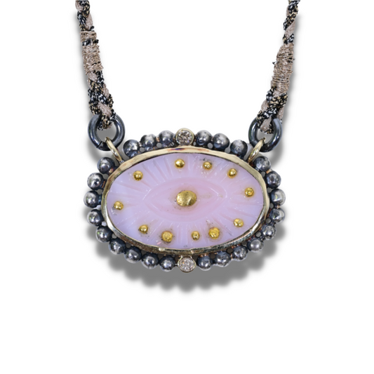 Carved Pink Opal Evil Eye
